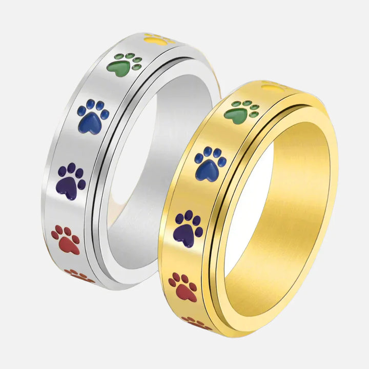 Anillo Giratorio Reductor de Estrés – Acero Inoxidable con Huellas Arcoíris